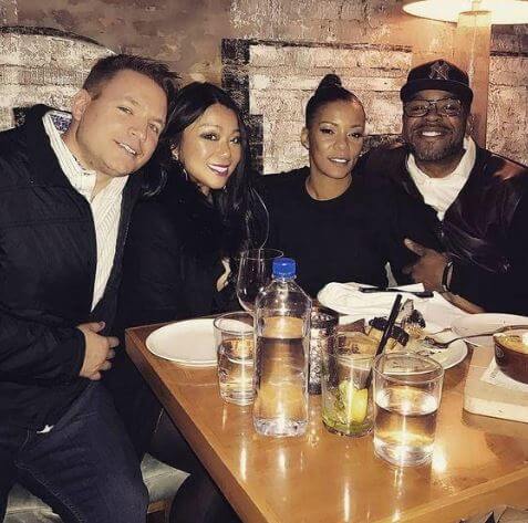 Tamika Smith with her husband and friends.